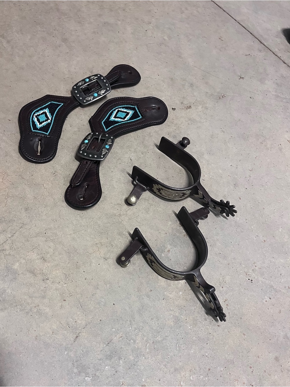 Weaver Black and Turquoise Men’s Spurs